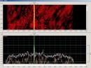 Radio Eritrea (VOBM) on 7175 kHz is jammed by white noise from Radio Ethiopia — both operating in A3E (AM) mode. Both carriers and the Radio Eritrea signal modulation are visible along with the white noise of Radio Ethiopia on both sidebands. [Screenshot by Wolf Hadel, DK2OM]